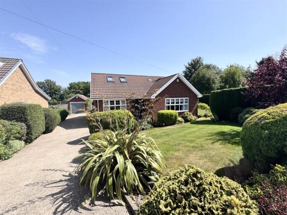 FRONT, GARAGE & DRIVEWAY