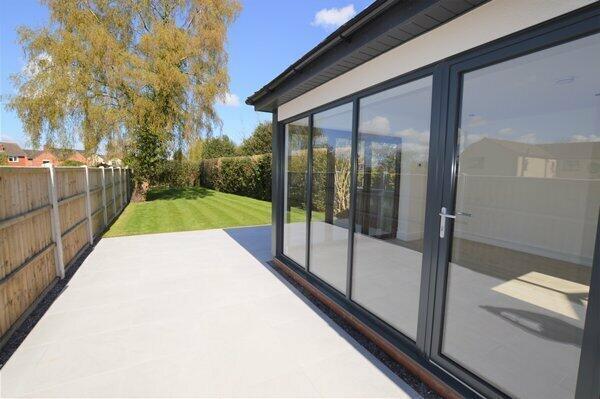 side of property & rear garden