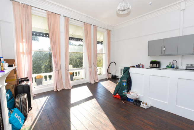 Sunlit Victorian Apartment Interior.png