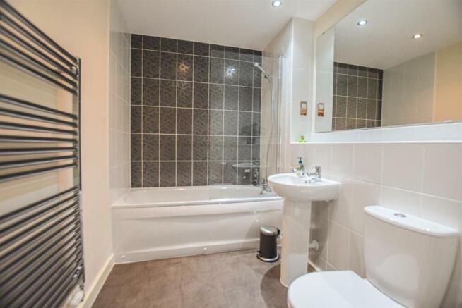 2  Riverbank Court - bathroom (brochure).jpg