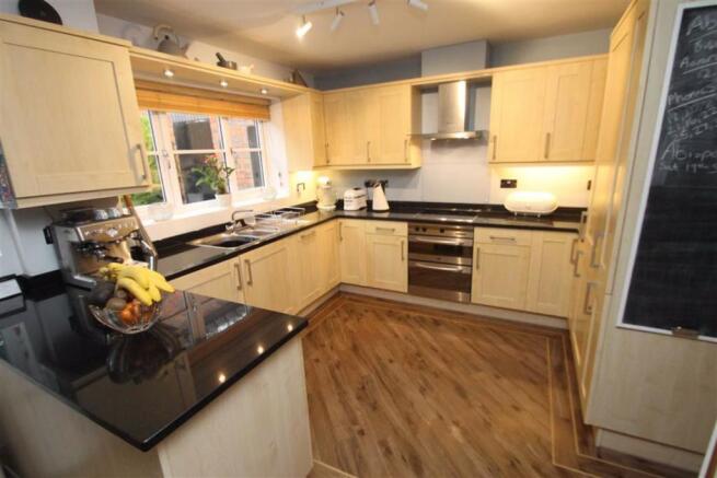 THROUGH KITCHEN/DINER