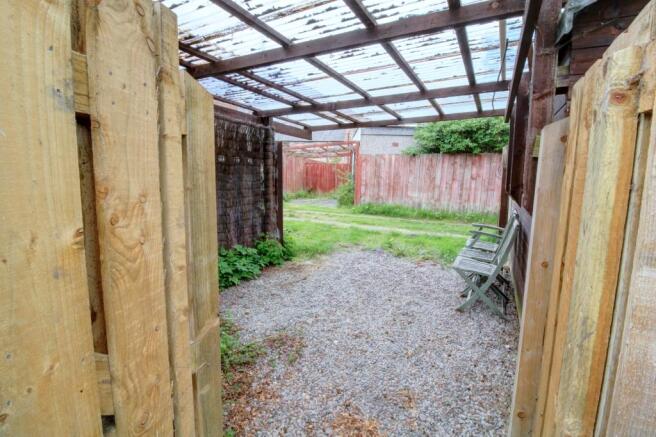 Car port at rear