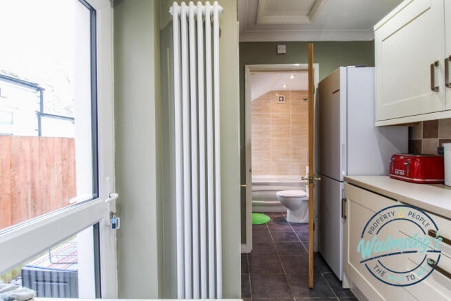 Kitchen towards bathroom
