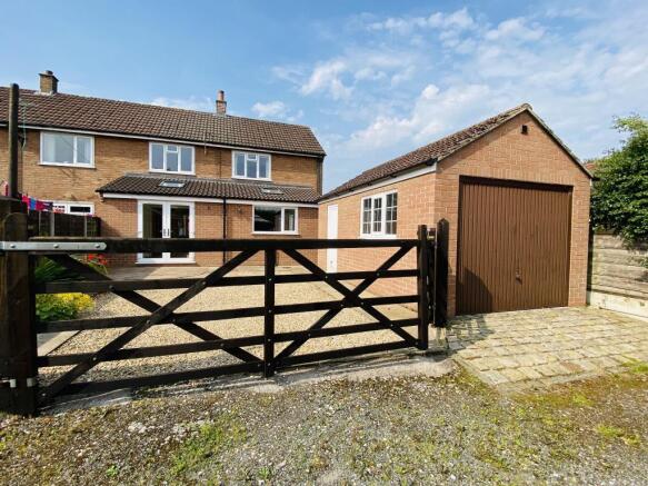 Rear patio area and Garage