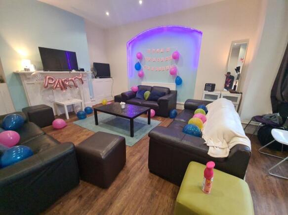 Bright and inviting living room featuring comfo...