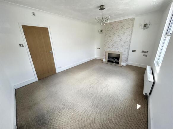 LIVING ROOM/ FOURTH BEDROOM