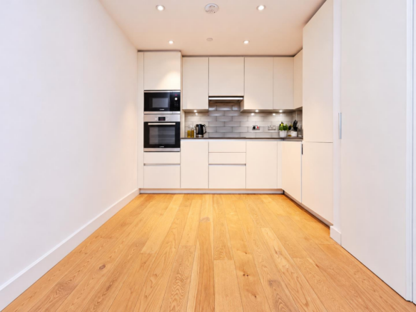 Minimalist Cream Kitchen with Oak Flooring.png