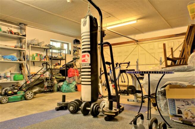 Integral double garage with store and boiler room