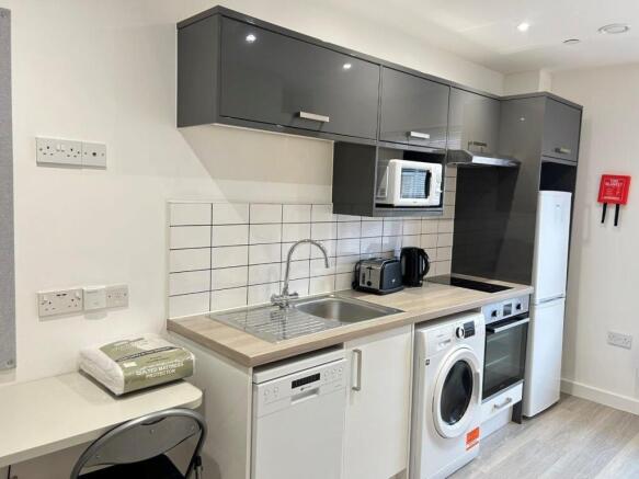 Modern kitchen with integrated appliances...