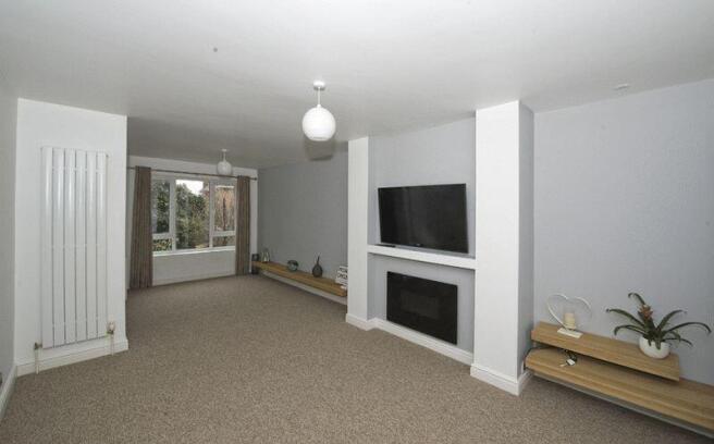 THROUGH LOUNGE/DINING ROOM