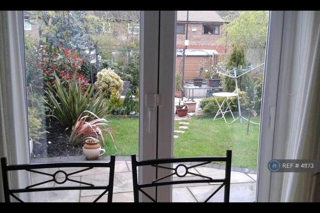 Rear Garden From Dining Area Through Patio Doors 