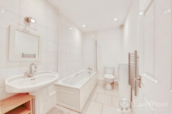 Bathroom with Over Bath Shower