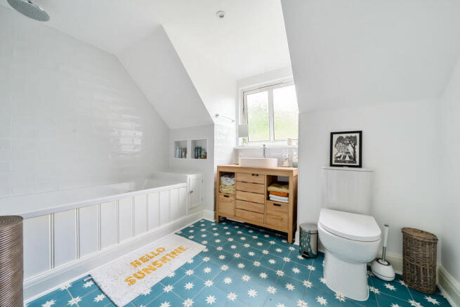 Family bathroom with underfloor heating