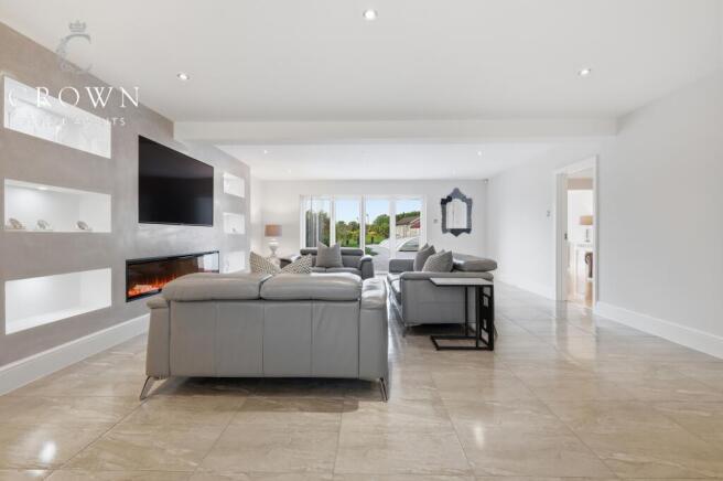 Beautifully presented formal lounge leading onto t