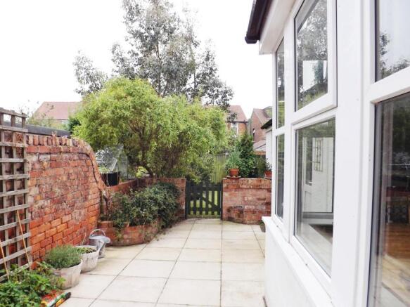 Side yard leading onto garden