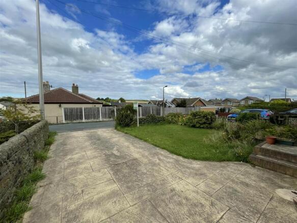 DRIVEWAY AND FRONT LAWN