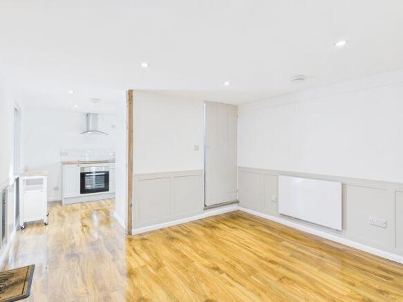 Sitting room through to kitchen