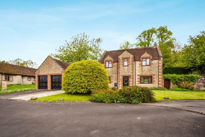 Front Exterior & Detached Garage