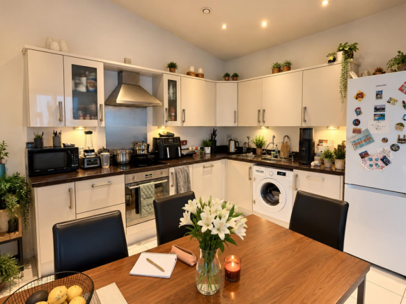 Warm Modern Kitchen Dining Scene.png