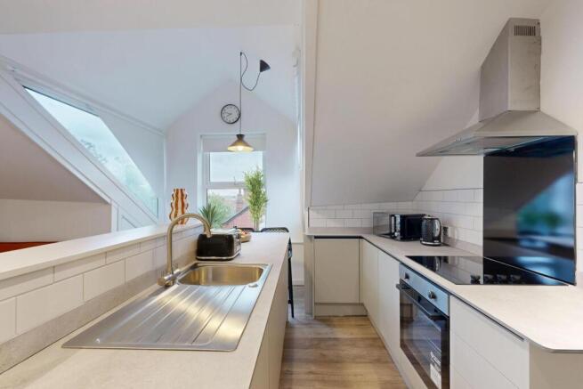 Modern and bright kitchen with ample natural li...