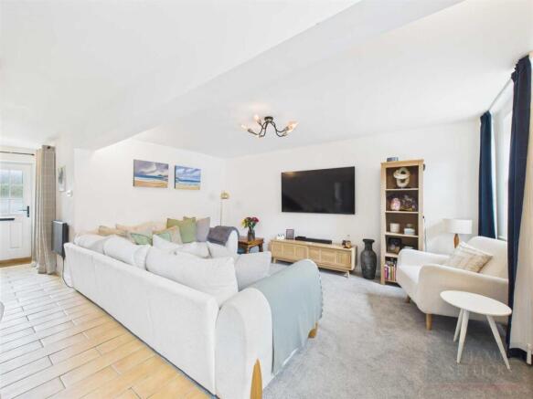 Open plan sitting and dining room