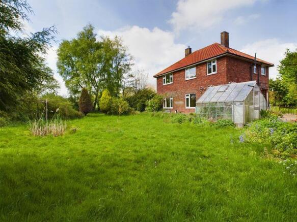 Rear elevation/grounds