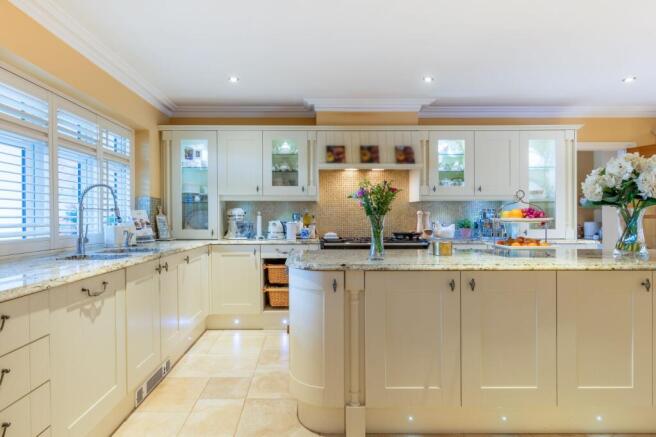 Bright kitchen with Brazilian marble worktops and under-floor heating