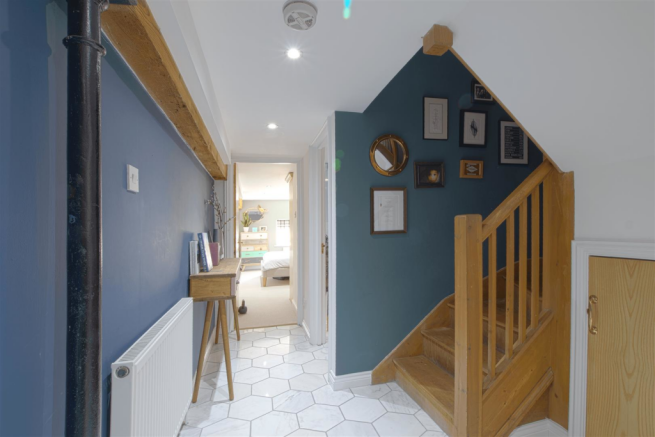 Exposed beams and marble flooring.png