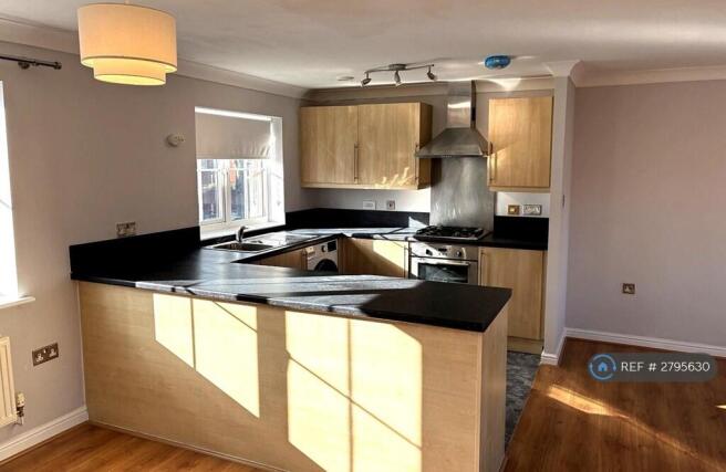 Modern Fitted Kitchen With Breakfast Bar