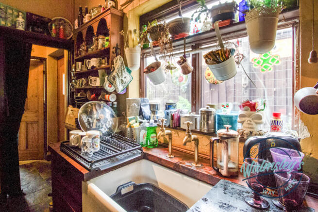 Kitchen with hardwood surfaces & belfast style sin