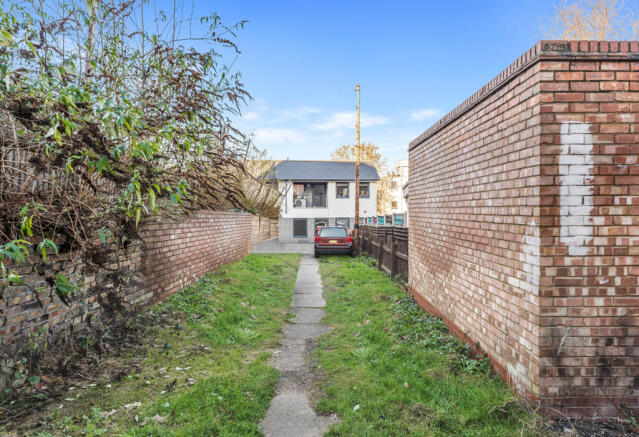 Looking down the shared garden away from property 