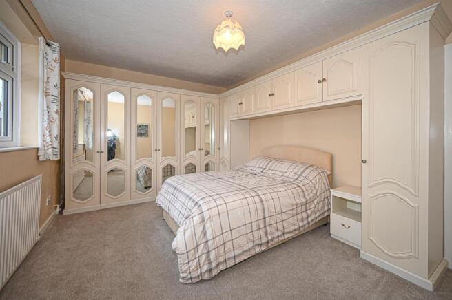 BEDROOM ONE TO REAR