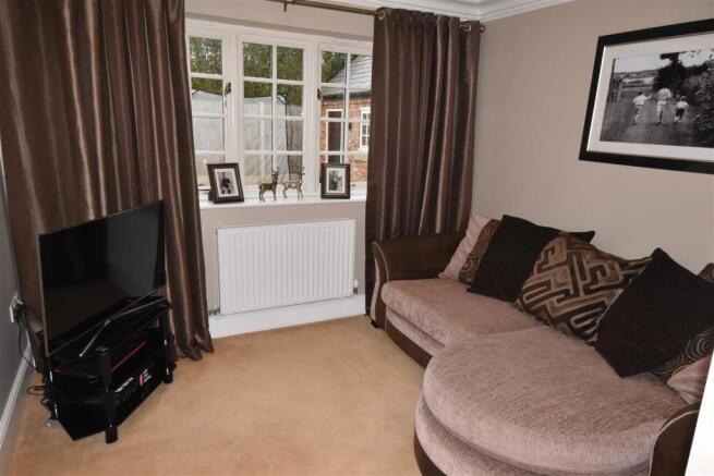 FAMILY ROOM/ SITTING ROOM