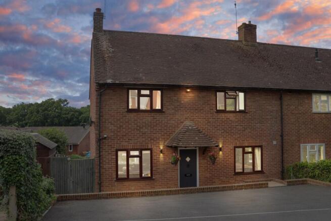 Front view of the property at dusk