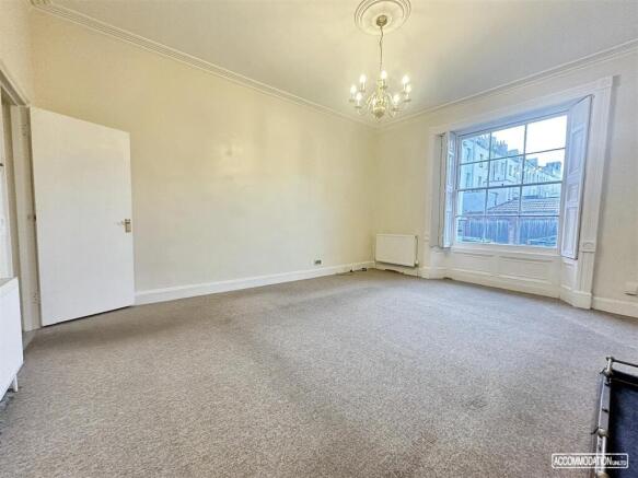 Bright, spacious room with large bay windows...