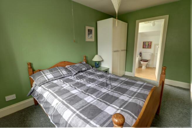 Master bedroom leading to ensuite