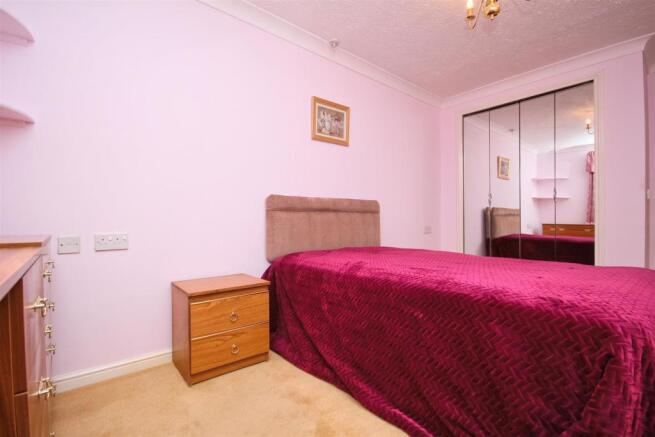 Bedroom one with fitted wardrobes
