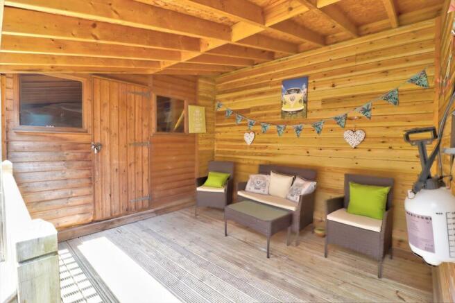 Rear garden deck and garden store studio.jpg