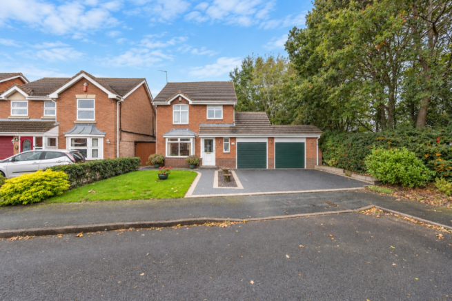 Autumn Suburban Brick House Exterior