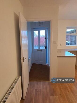 Front Door And Kitchen