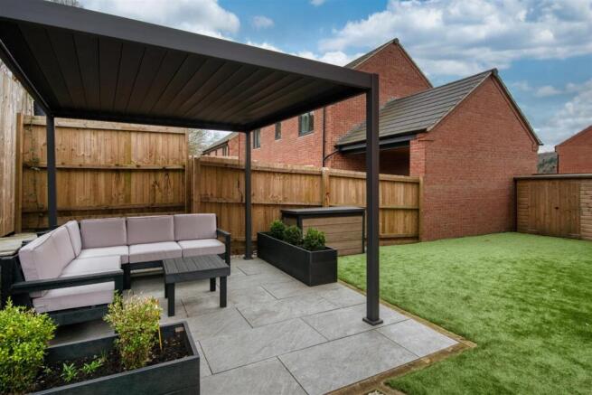 Garden - dining patio and astroturf lawn.jpg