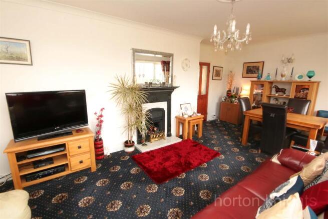 THROUGH LOUNGE & DINING ROOM