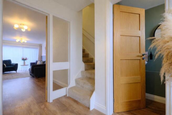Entrance hall, cloakroom & sitting room