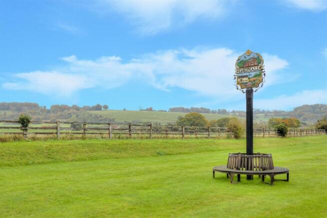 view over countryside and village sign.jpg