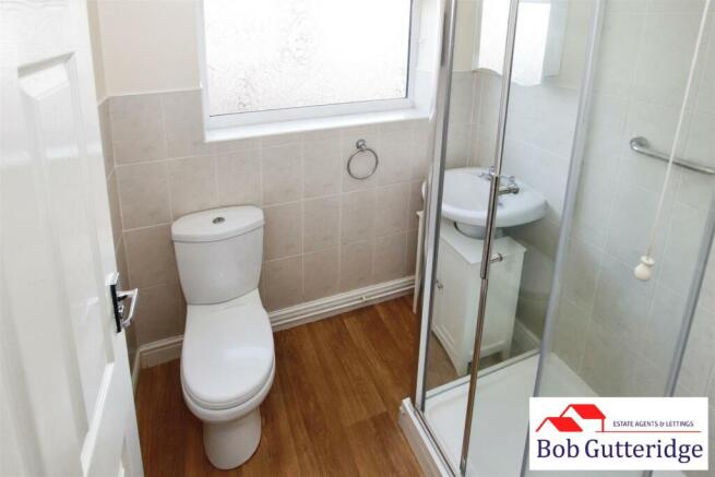 FULLY TILED SHOWER ROOM