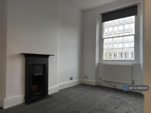 Living Room With Period Fireplace