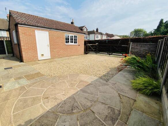 Patio and gravel back garden