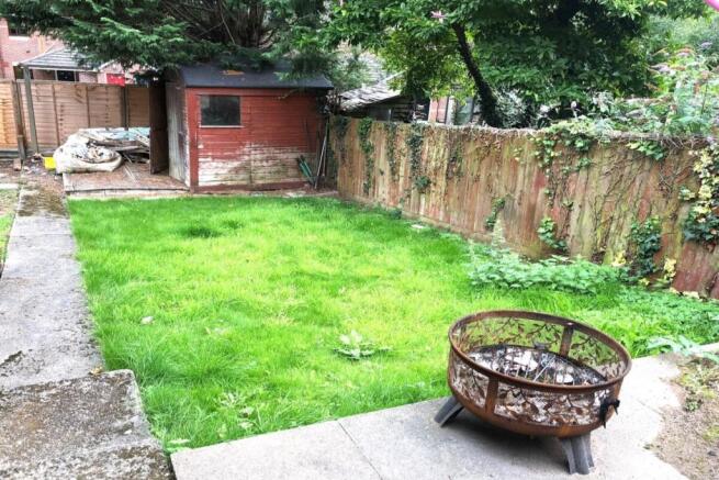 Enclosed Rear Gardebn And Paved Patio