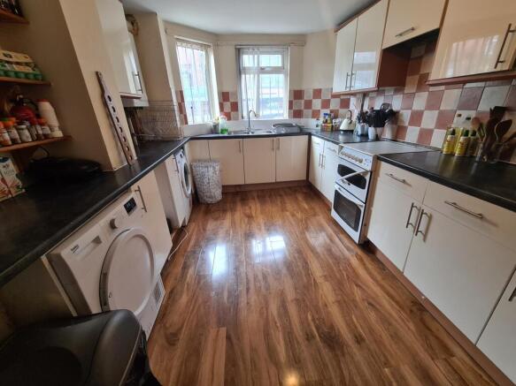 Bright and well-maintained kitchen featuring mo...