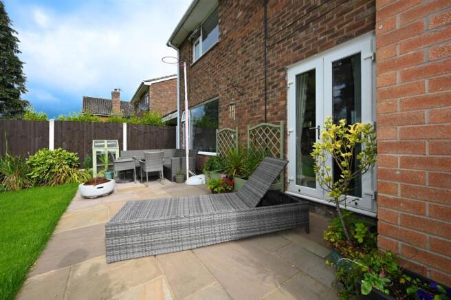 Patio and gardens to rear